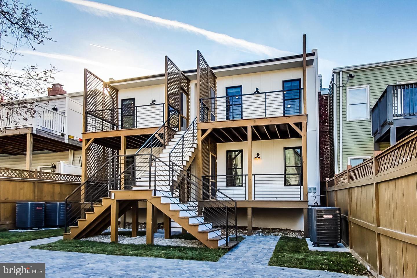 428 Evarts Street Northeast, Unit 2 Washington, DC 20017 - Photo 31 of 37 a front view of a house with garden