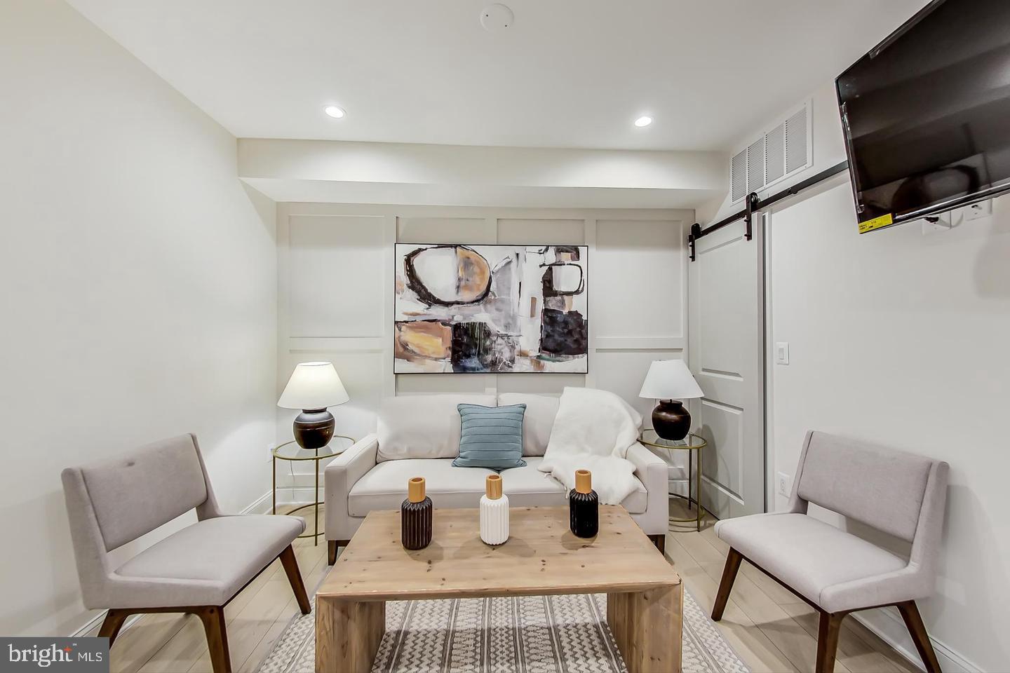 428 Evarts Street Northeast, Unit 2 Washington, DC 20017 - Photo 5 of 37 a kitchen with a table and chairs