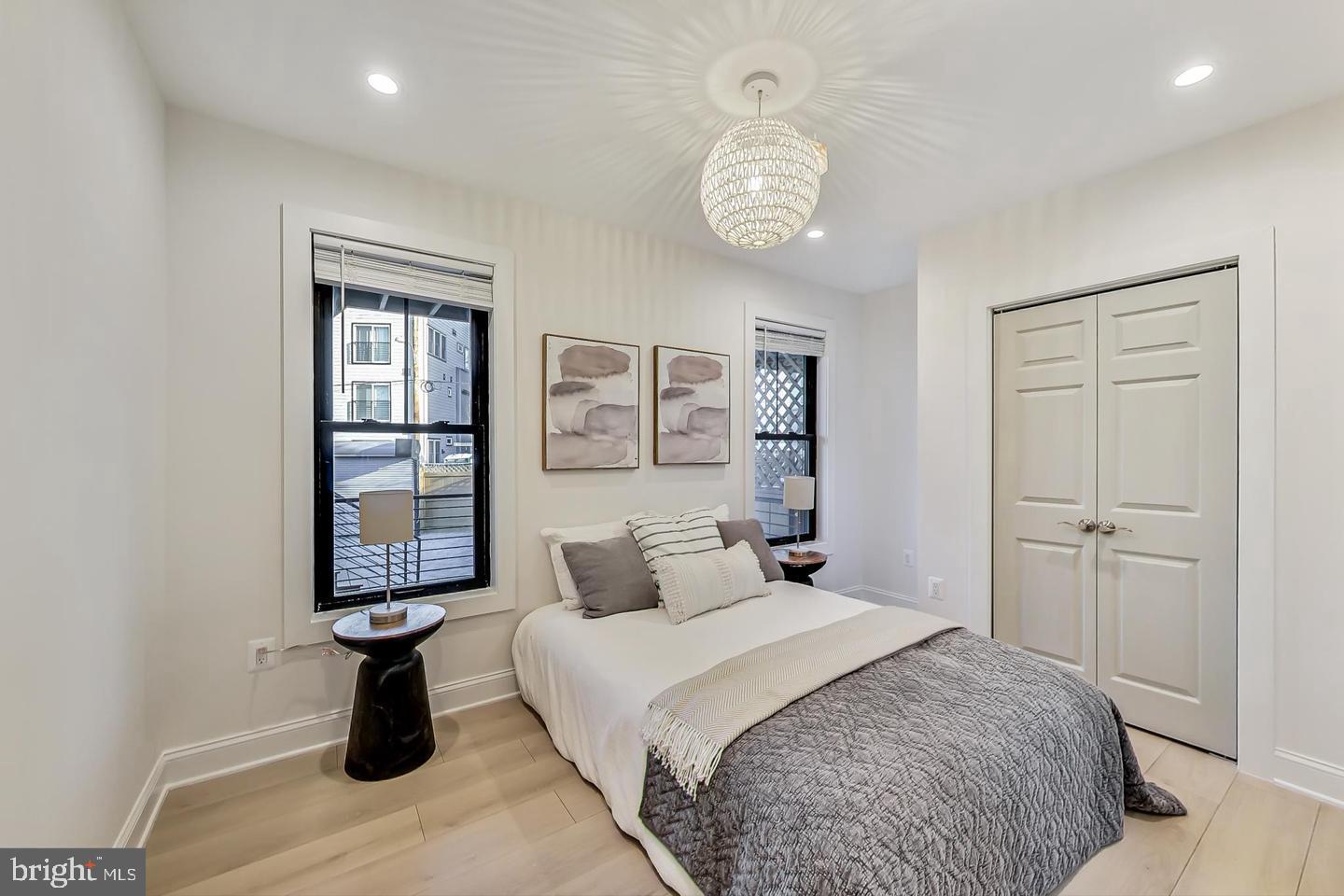 428 Evarts Street Northeast, Unit 2 Washington, DC 20017 - Photo 9 of 37 a bedroom with a bed and a window