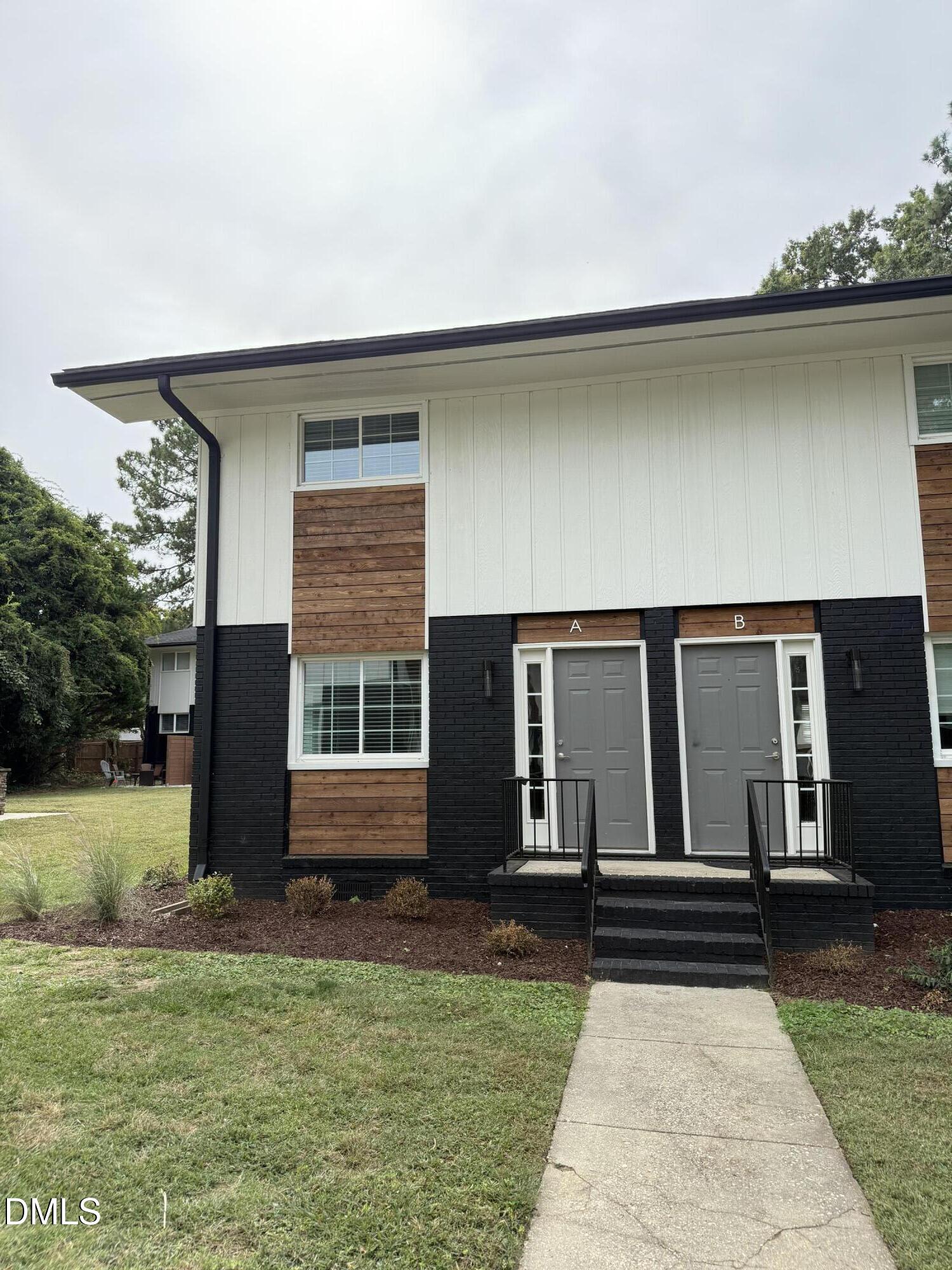 2604 Noble Road, Unit C Raleigh, NC 27608 - Photo 6 of 7 a front view of house with yard