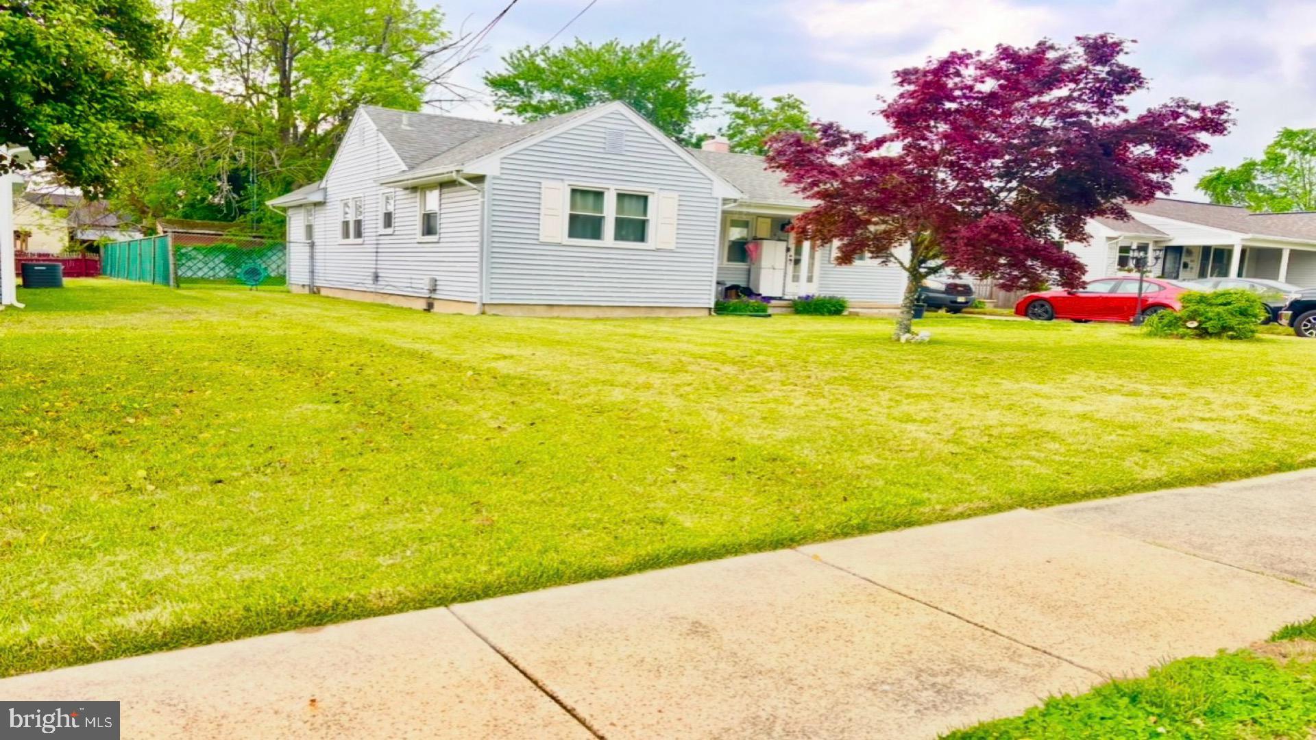 637 Polk Street Riverside, NJ 08075 - Photo 2 of 18 Charming home with vibrant landscaping.