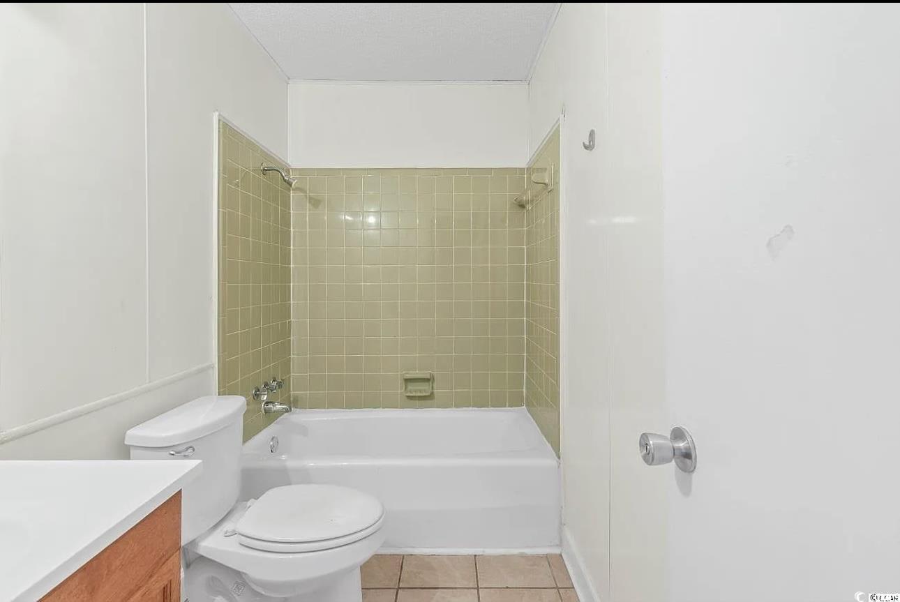 1025 Carolina Road, Unit H4 Conway, SC 29526 - Photo 3 of 10 Full bathroom with vanity, shower / tub combination, and tile patterned floors