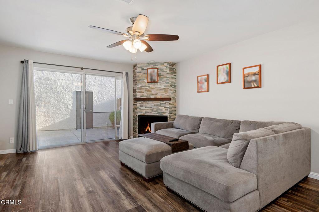3175 Kelp Lane Oxnard, CA 93035 - Photo 4 of 15 a living room with furniture and a fireplace