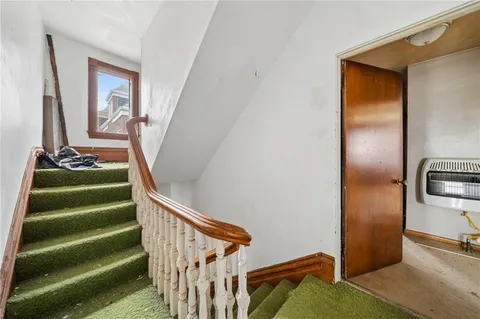 a view of front door with stairs