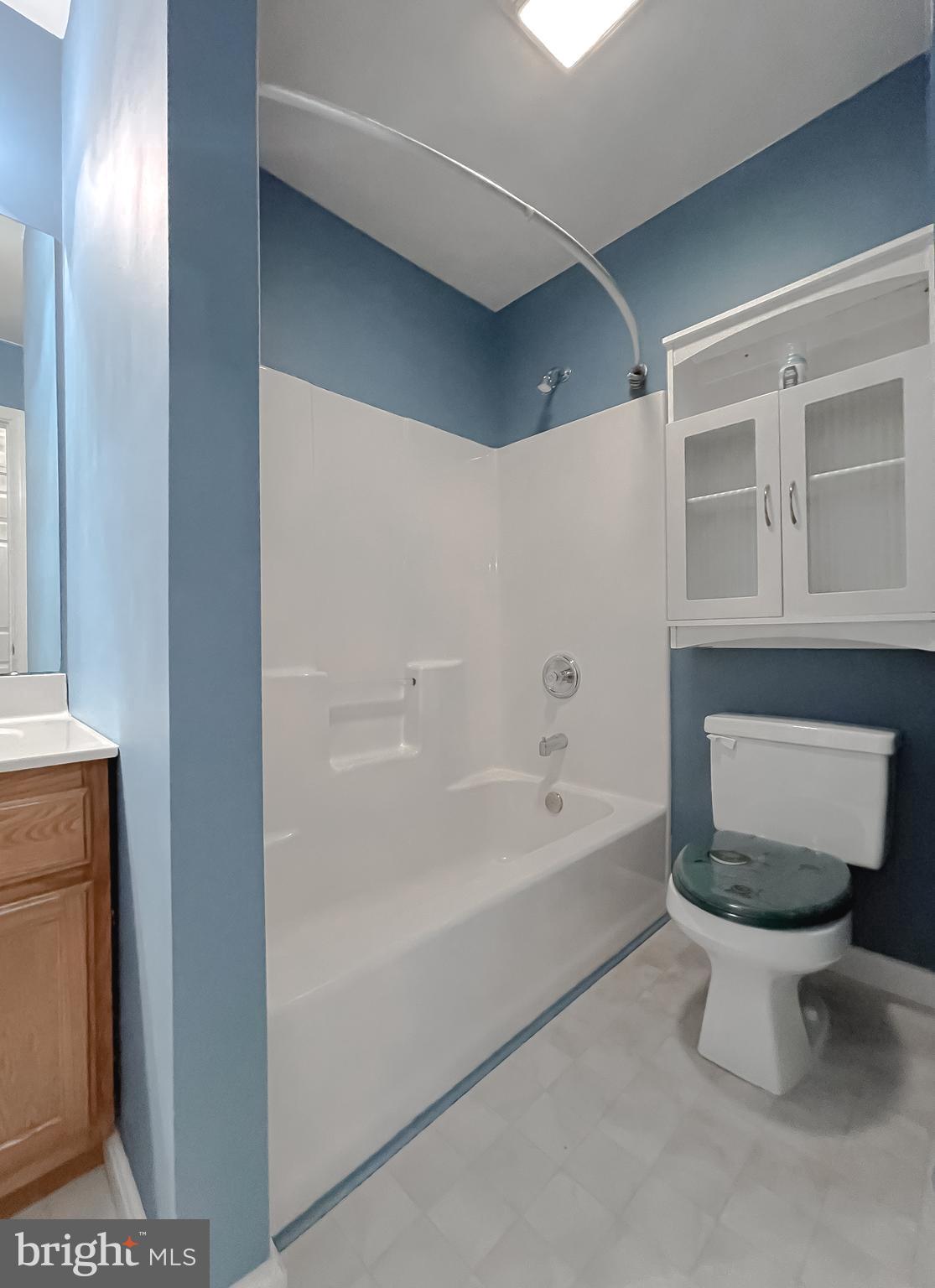11517 Wrangler Road Lusby, MD 20657 - Photo 18 of 52 a bathroom with a toilet a sink and bathtub