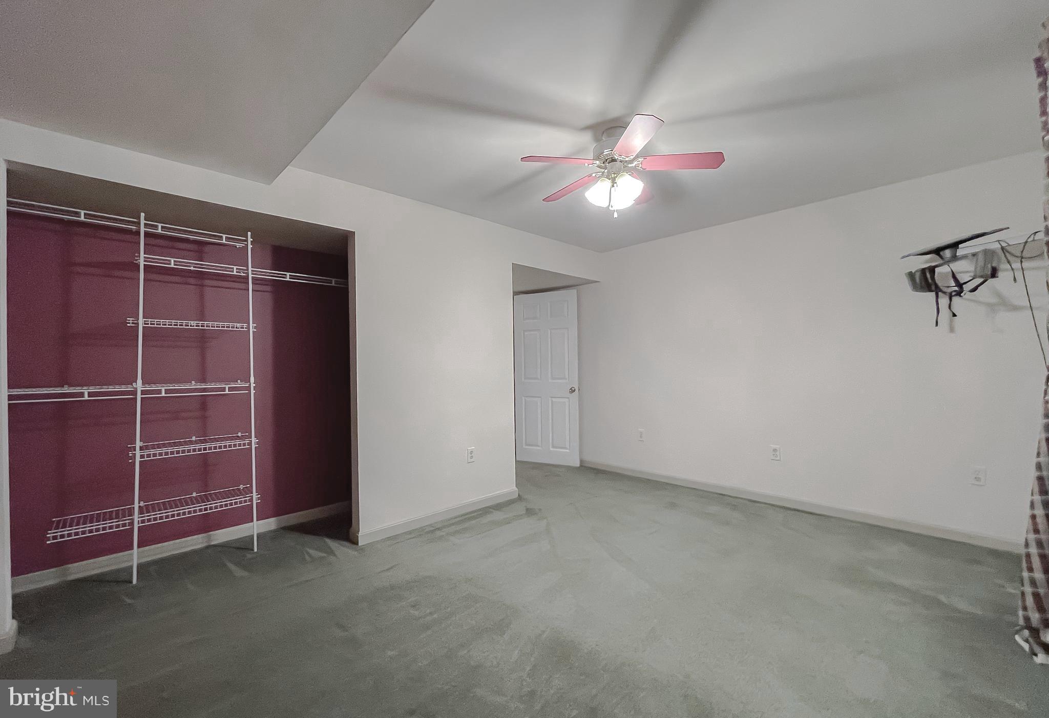 11517 Wrangler Road Lusby, MD 20657 - Photo 39 of 52 an empty room with a empty space and windows