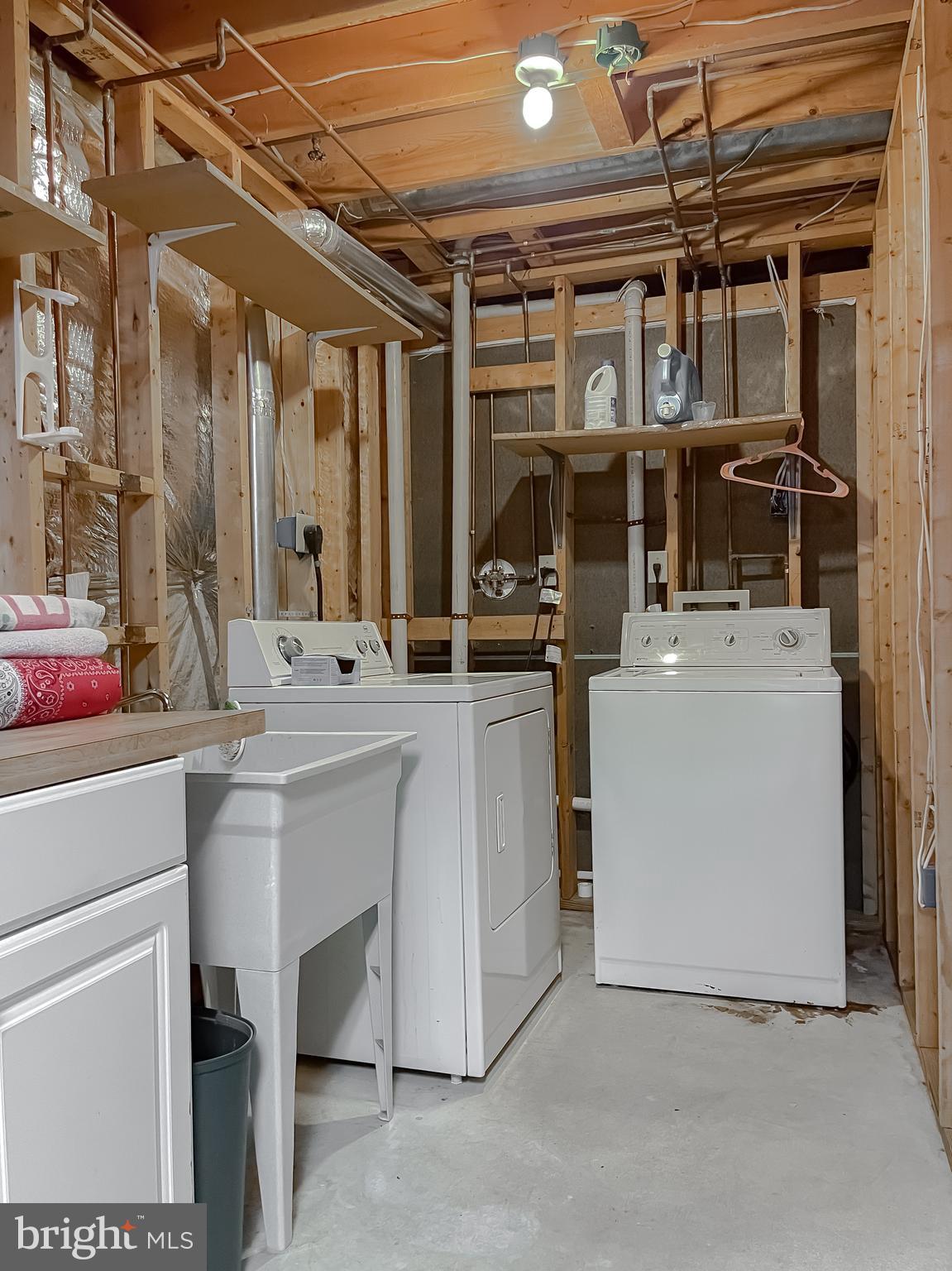 11517 Wrangler Road Lusby, MD 20657 - Photo 42 of 52 a utility room with dryer and washer