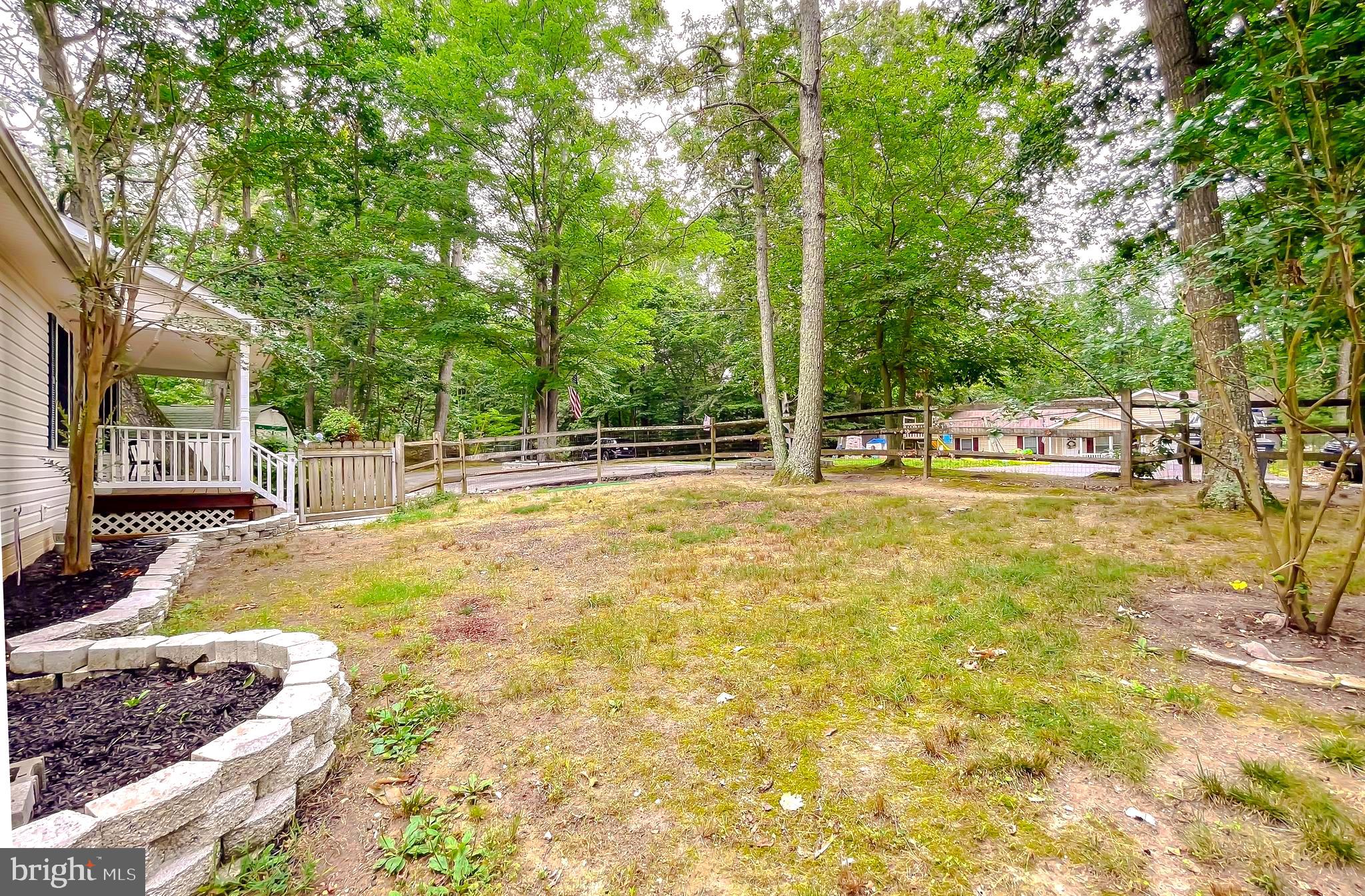 11517 Wrangler Road Lusby, MD 20657 - Photo 51 of 52 a house view with swimming pool in back