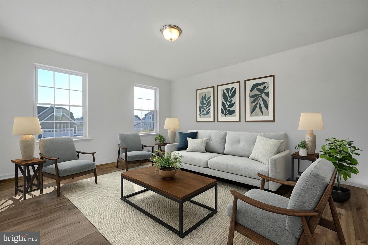 1280 Maple Lane, Unit 10 Hanover, PA 17331 - Photo 2 of 20 a living room with furniture and a potted plant