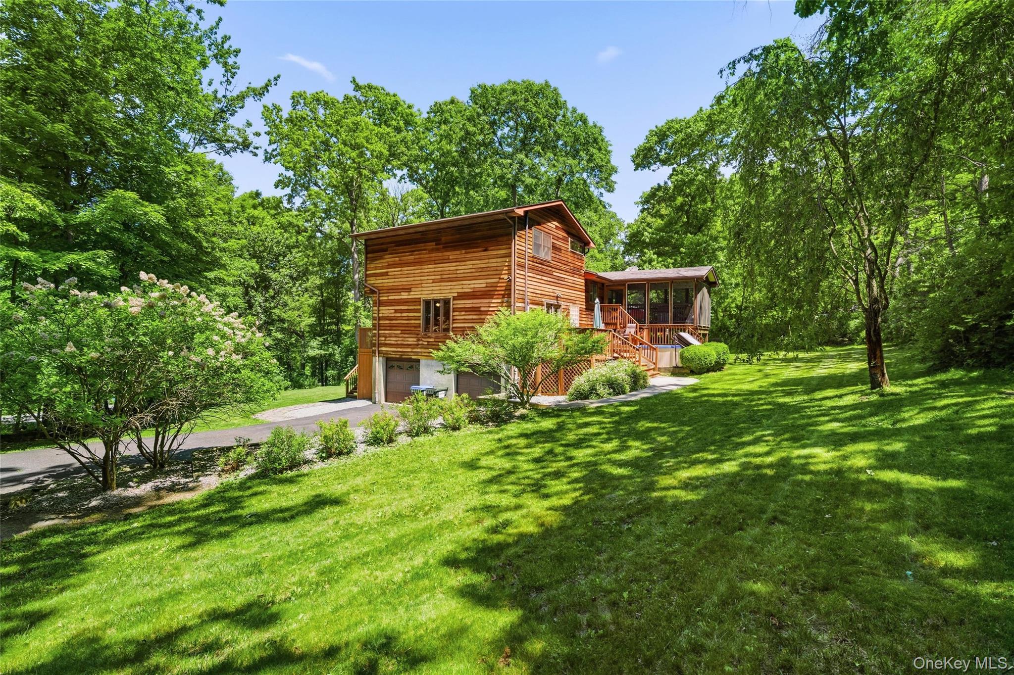 44 Sayer Road Blooming Grove, NY 10914 - Photo 28 of 39 a view of a house with a big yard plants and large trees