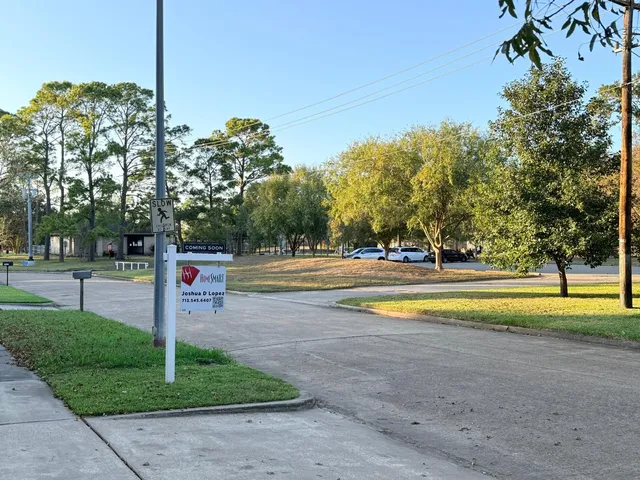 a view of pool with tree s