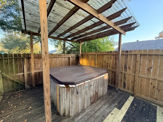 a view of backyard with green space