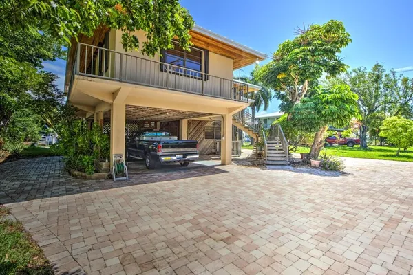 a view of a swimming pool with an ocean view