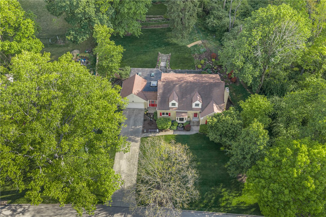 156 West Hadley Road Dayton, OH 45419 - Photo 69 of 71 This charming residence is nestled amidst lush greenery, offering a private and serene living environment.