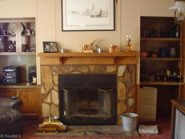 248 Creed Road Ararat, NC 27007 - Photo 4 of 9 Other. Den with FP & built in shelves