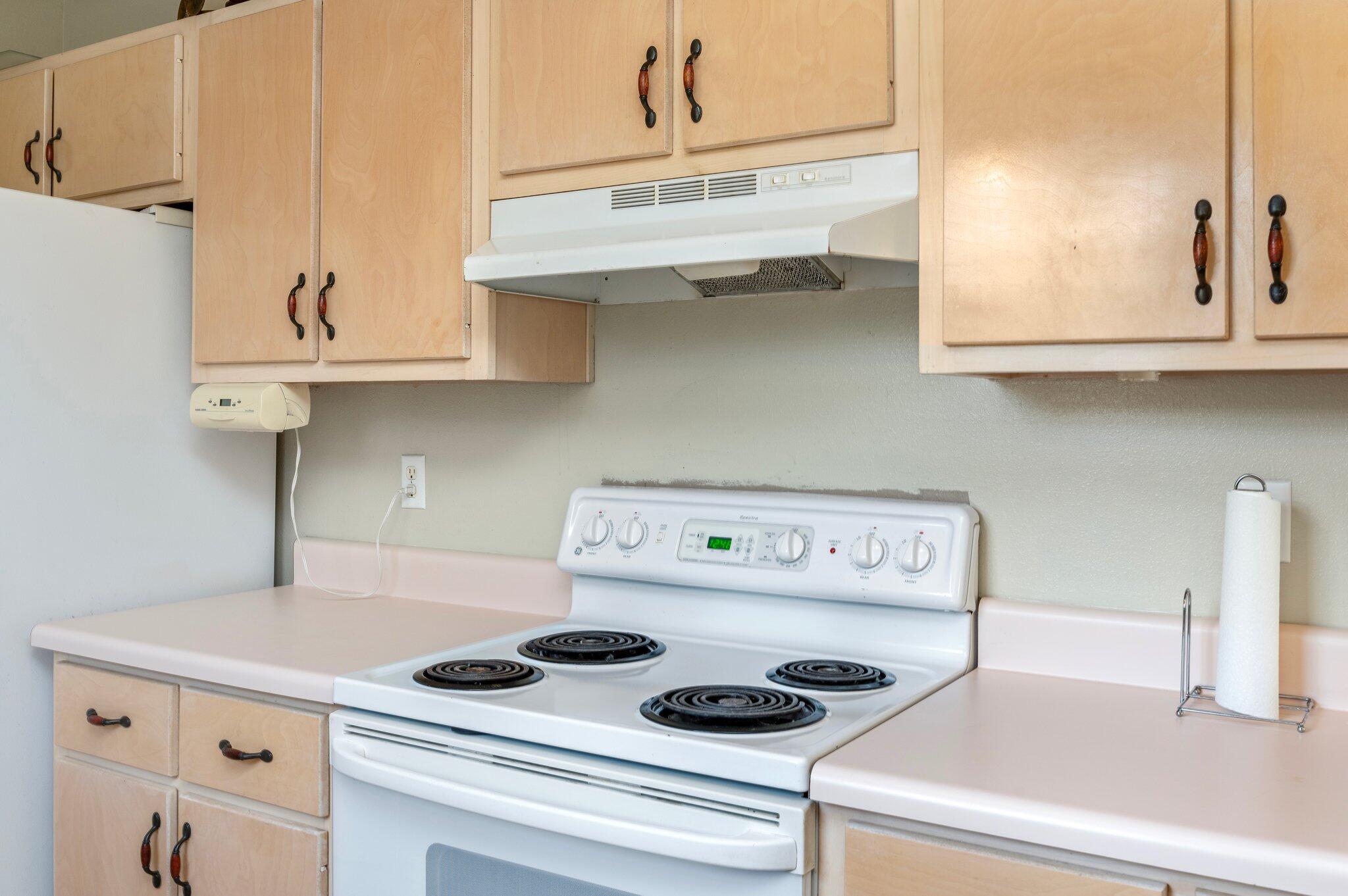 17 Flora Cove Crestview, FL 32539 - Photo 12 of 31 a kitchen with a stove and a cabinets