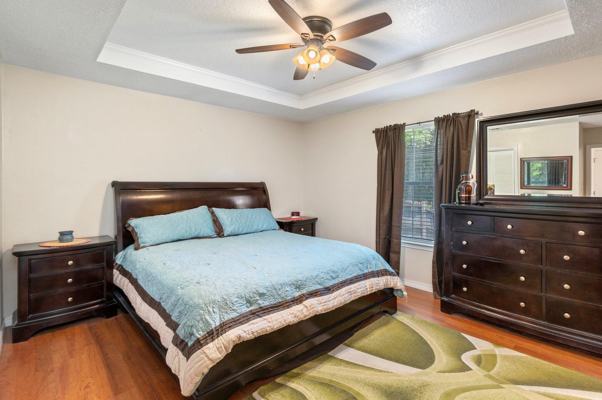 17 Flora Cove Crestview, FL 32539 - Photo 15 of 31 a bedroom with a bed and a dresser