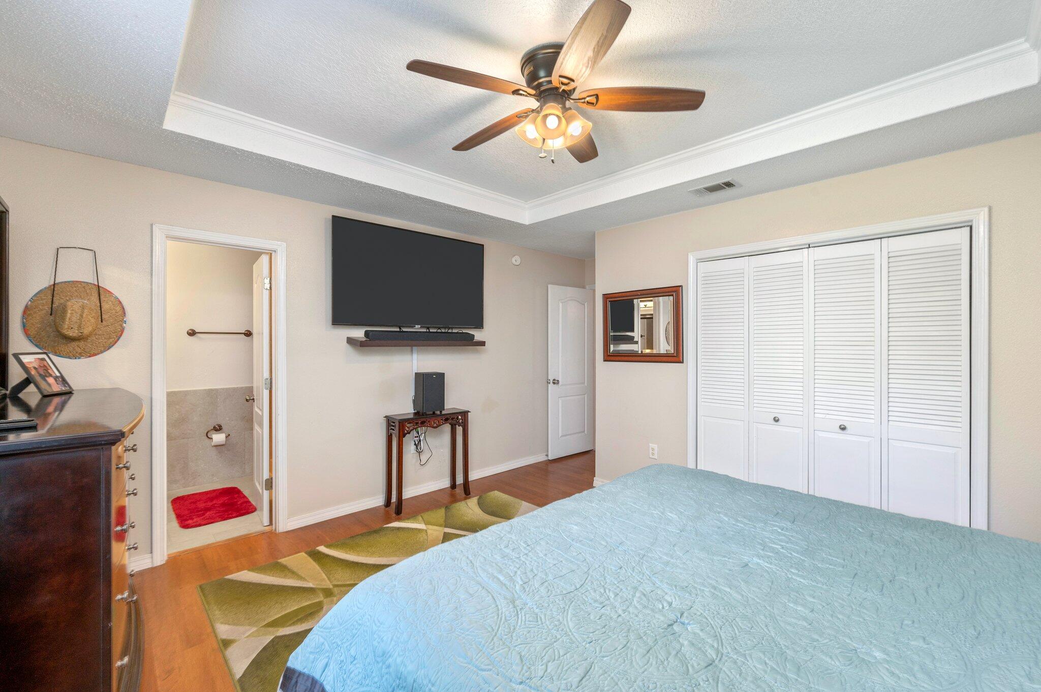 17 Flora Cove Crestview, FL 32539 - Photo 17 of 31 a bedroom with a bed and a flat screen tv