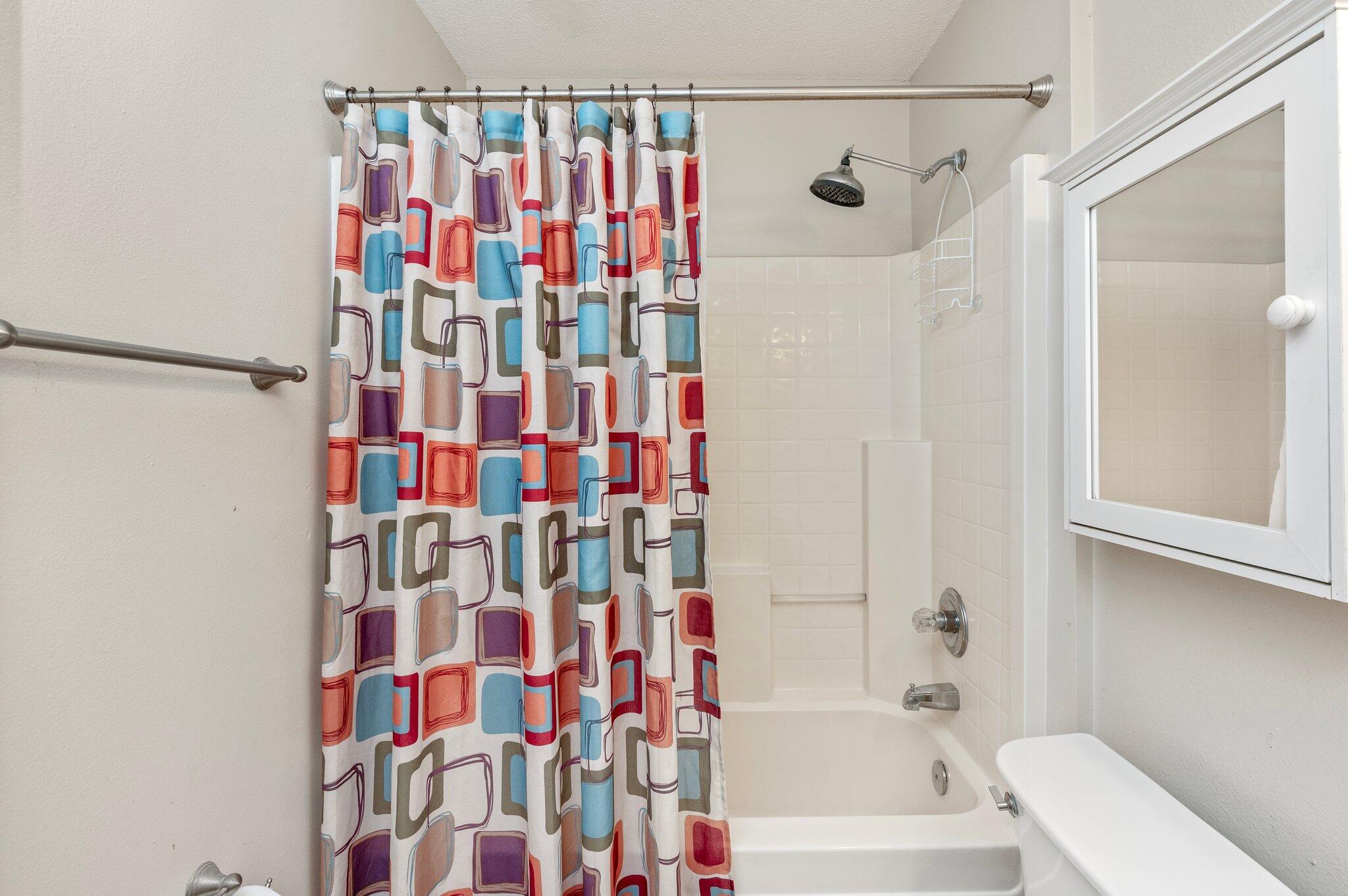 17 Flora Cove Crestview, FL 32539 - Photo 25 of 31 a bathroom with a shower curtain and a curtain
