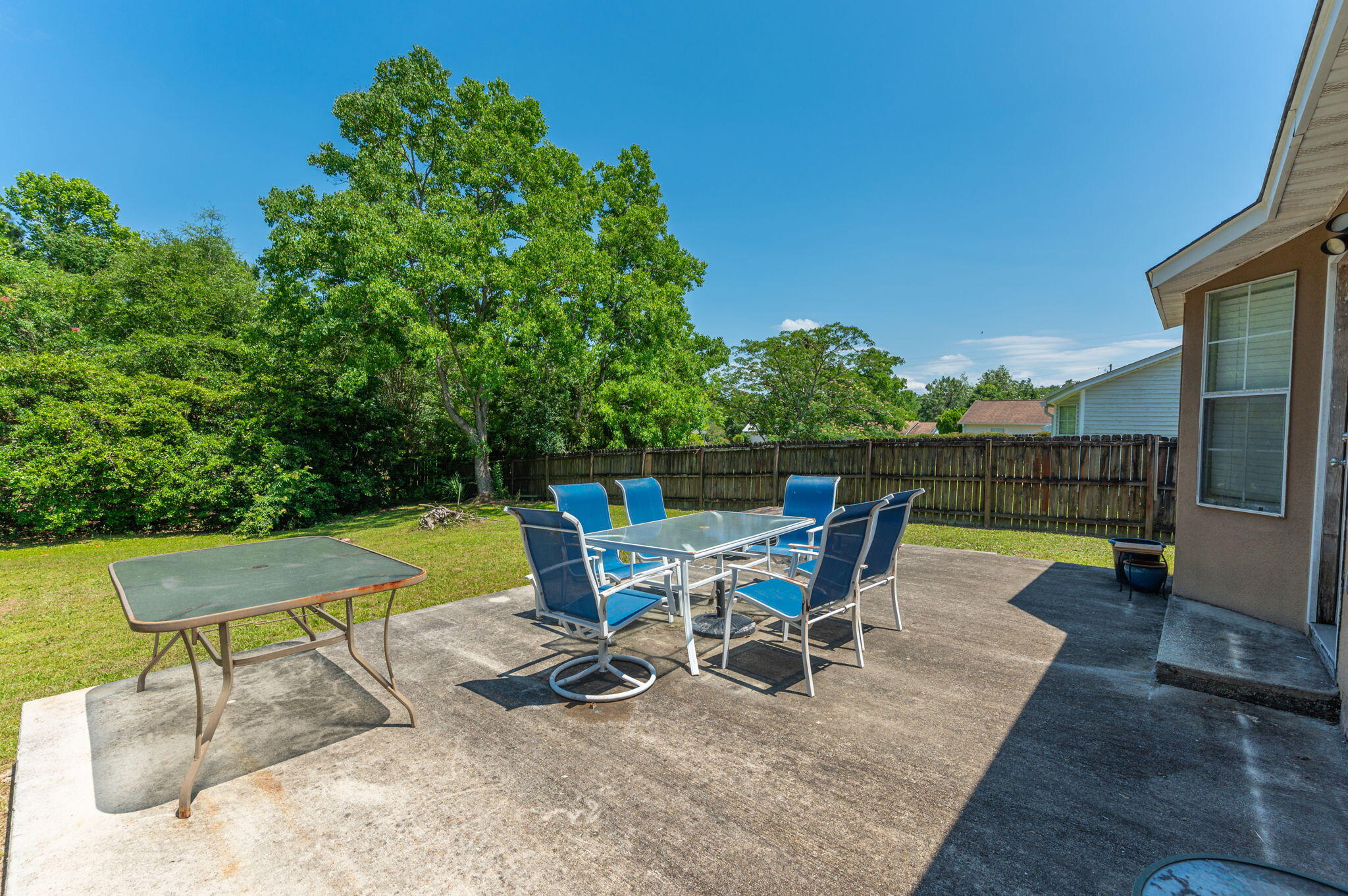 17 Flora Cove Crestview, FL 32539 - Photo 27 of 31 a view of a swimming pool with chair and table