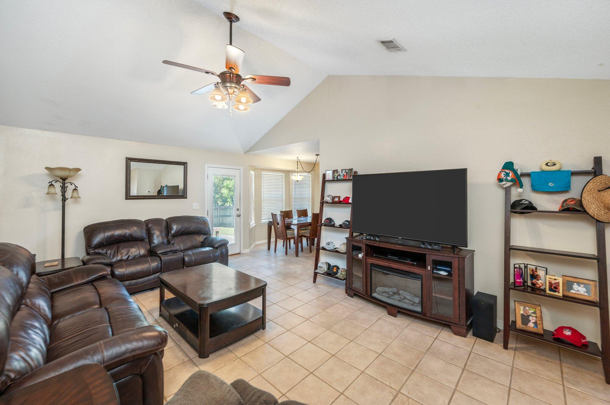 17 Flora Cove Crestview, FL 32539 - Photo 6 of 31 a living room with furniture and a flat screen tv
