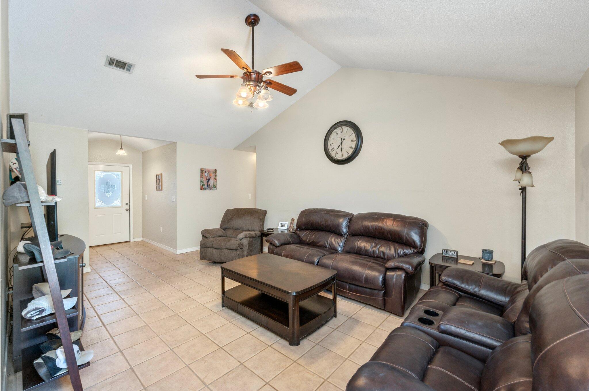 17 Flora Cove Crestview, FL 32539 - Photo 7 of 31 a living room with furniture a air conditioner and a window