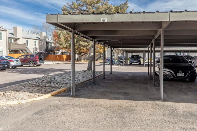 a view of parking garage with a car parked