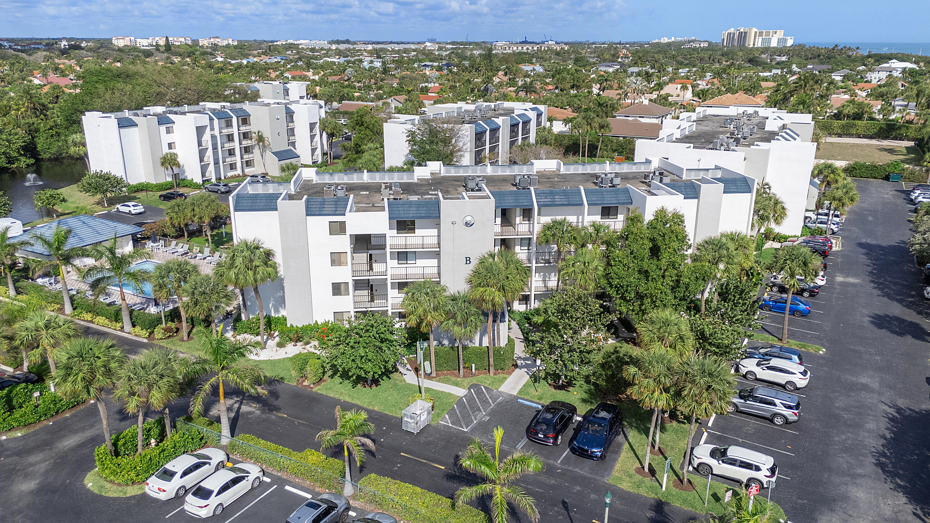 1605 Highway 1, Unit B404 Jupiter, FL 33477 - Photo 12 of 17 a view of building with yard