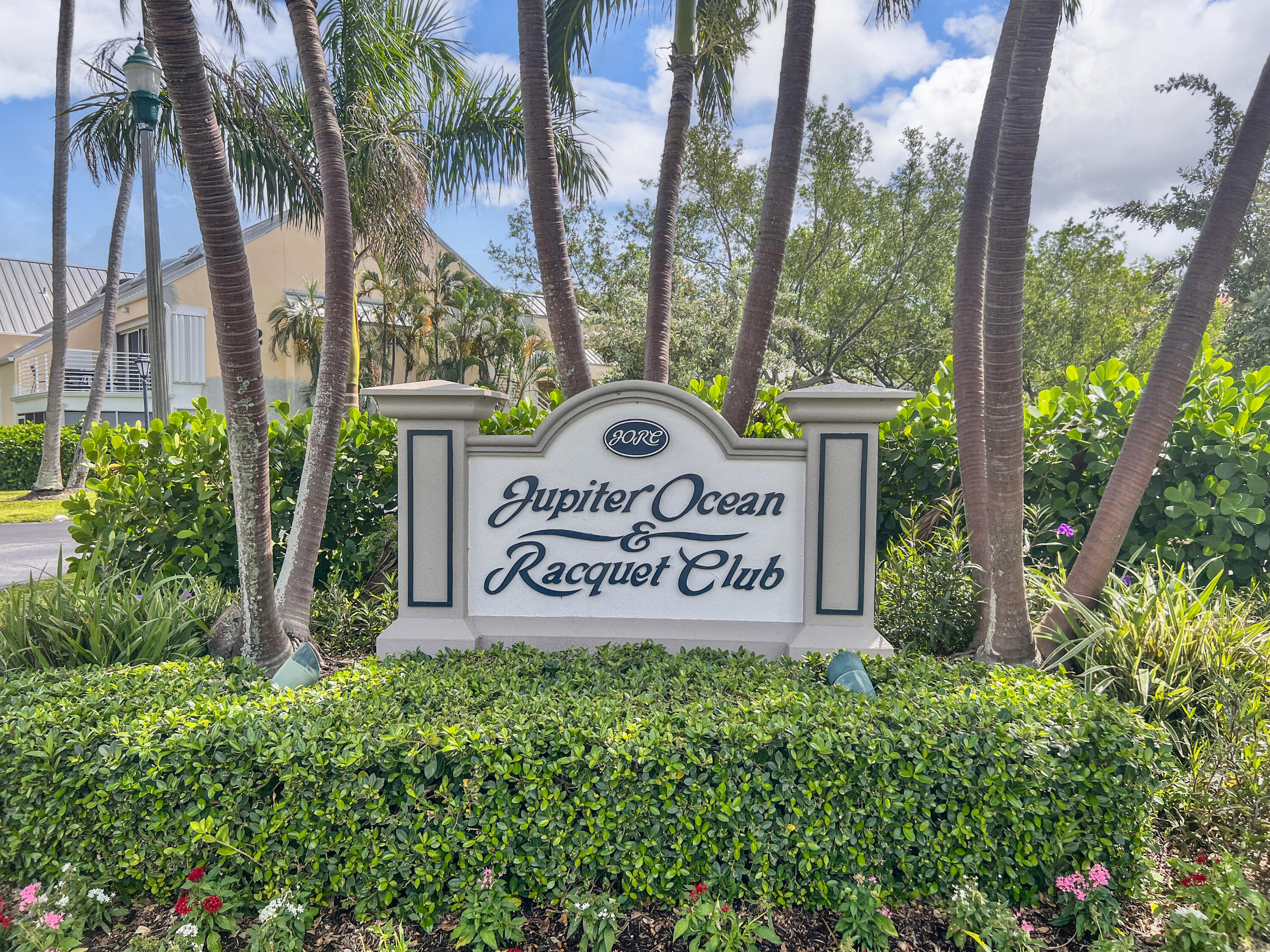 1605 Highway 1, Unit B404 Jupiter, FL 33477 - Photo 17 of 17 a sign on the side of a building