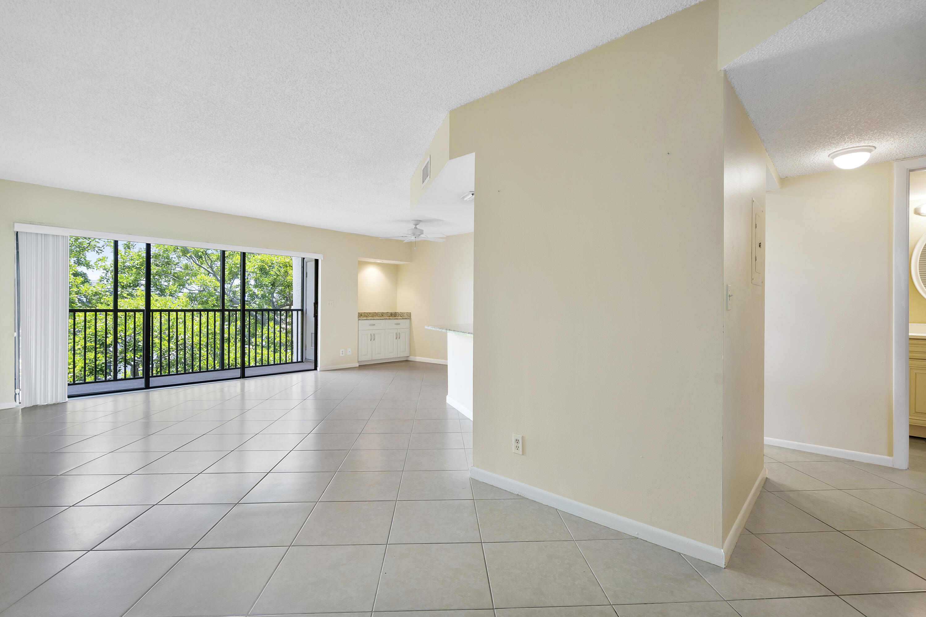 1605 Highway 1, Unit B404 Jupiter, FL 33477 - Photo 6 of 17 a view of empty room with floor to ceiling window