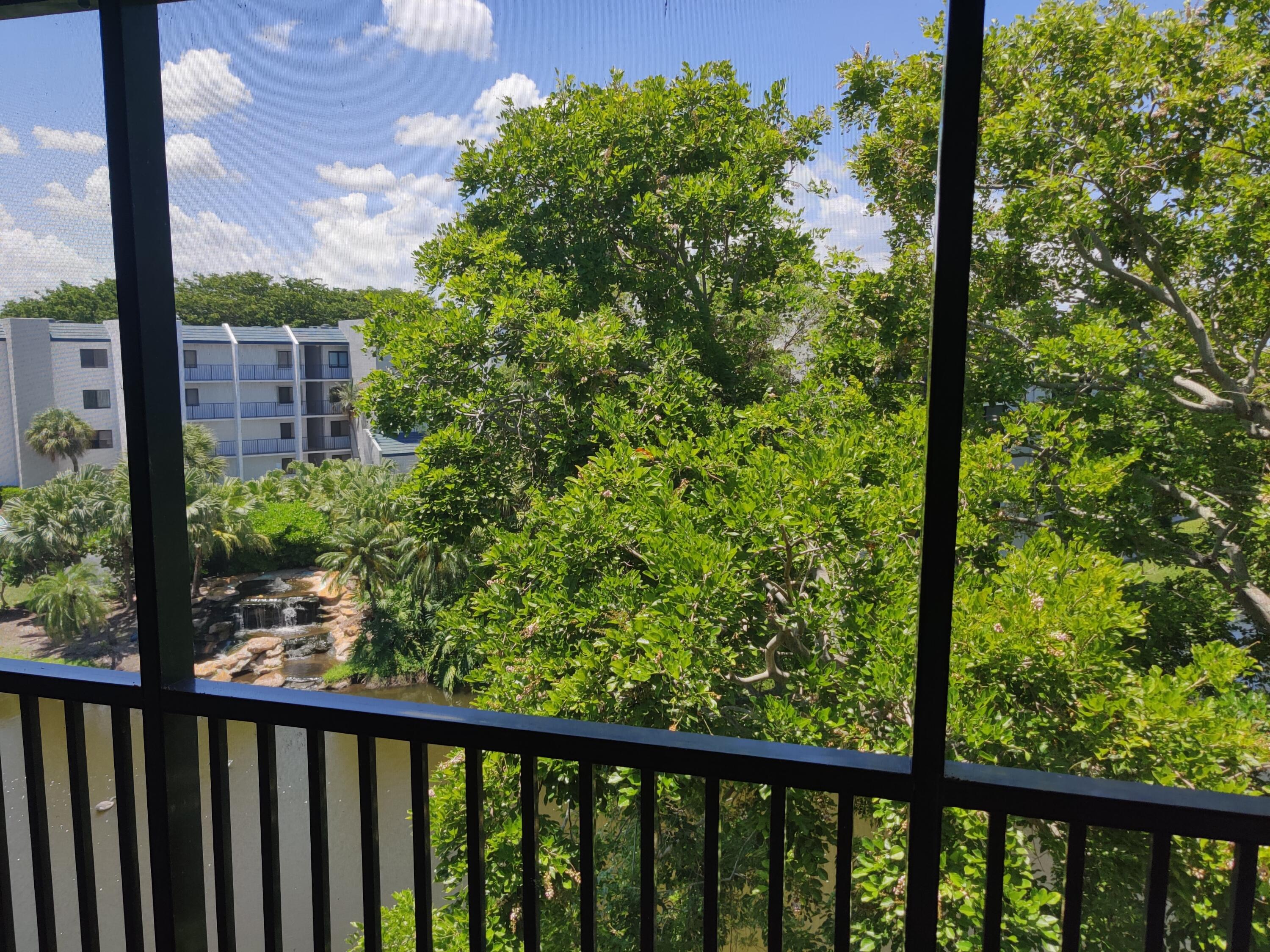 1605 Highway 1, Unit B404 Jupiter, FL 33477 - Photo 7 of 17 a view of a garden