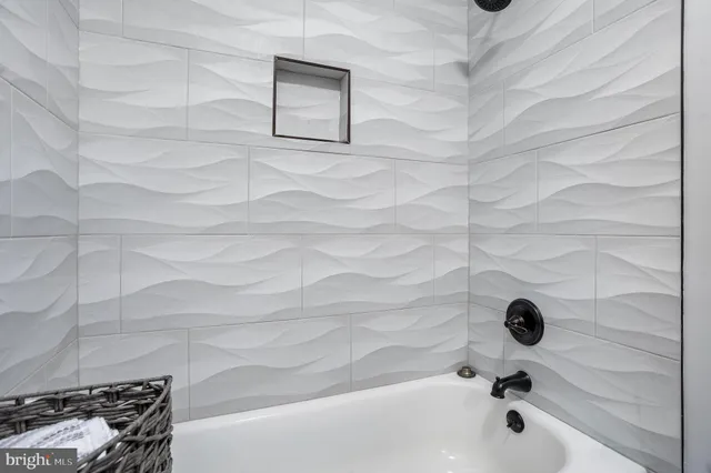 a bathroom with a bathtub