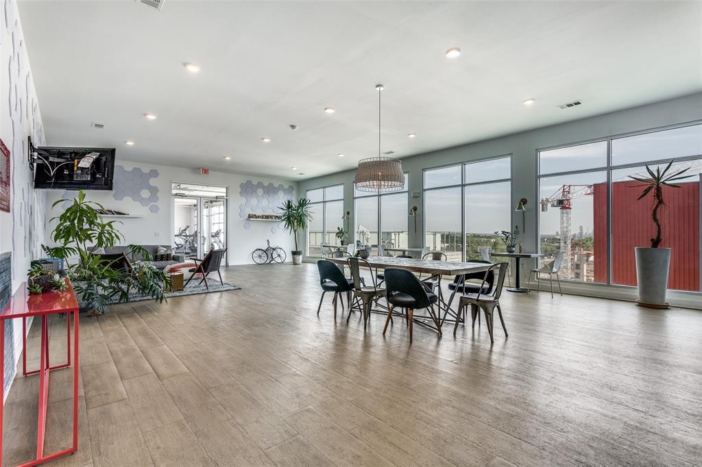 4361 South Congress Avenue, Unit 531 Austin, TX 78745 - Photo 15 of 21 an open kitchen with a table and chairs