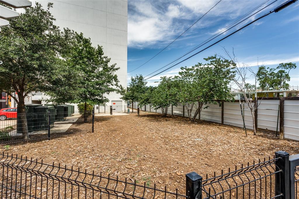 4361 South Congress Avenue, Unit 531 Austin, TX 78745 - Photo 19 of 21 a house with trees in front of it