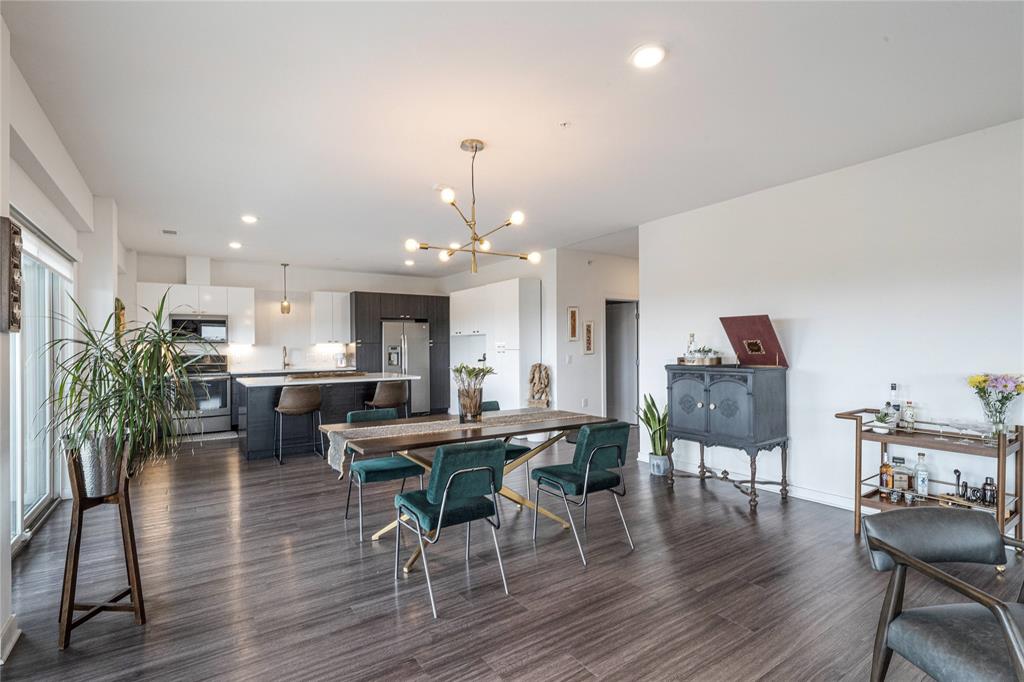 4361 South Congress Avenue, Unit 531 Austin, TX 78745 - Photo 4 of 21 a view of a dining room with furniture and wooden floor