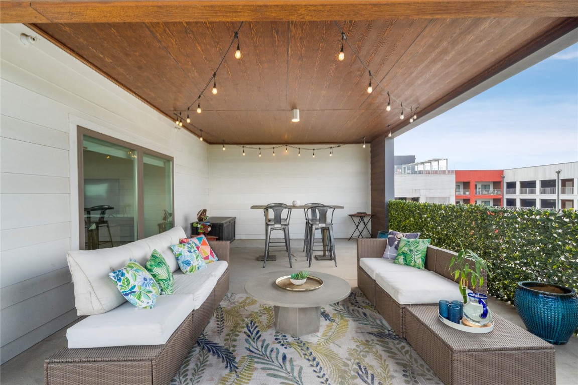 4361 South Congress Avenue, Unit 531 Austin, TX 78745 - Photo 6 of 21 a living room with furniture and a large window