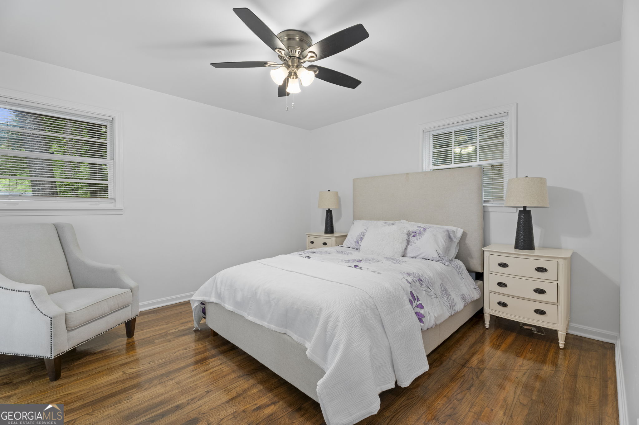 3567 Forrest Park Road Southeast Atlanta, GA 30354 - Photo 19 of 29 a bedroom with a bed and a couch