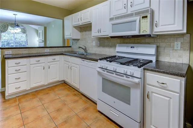 $249,900 | 2191 Rockbridge Road Southwest, Unit 102, Stone Mountain, GA 30087