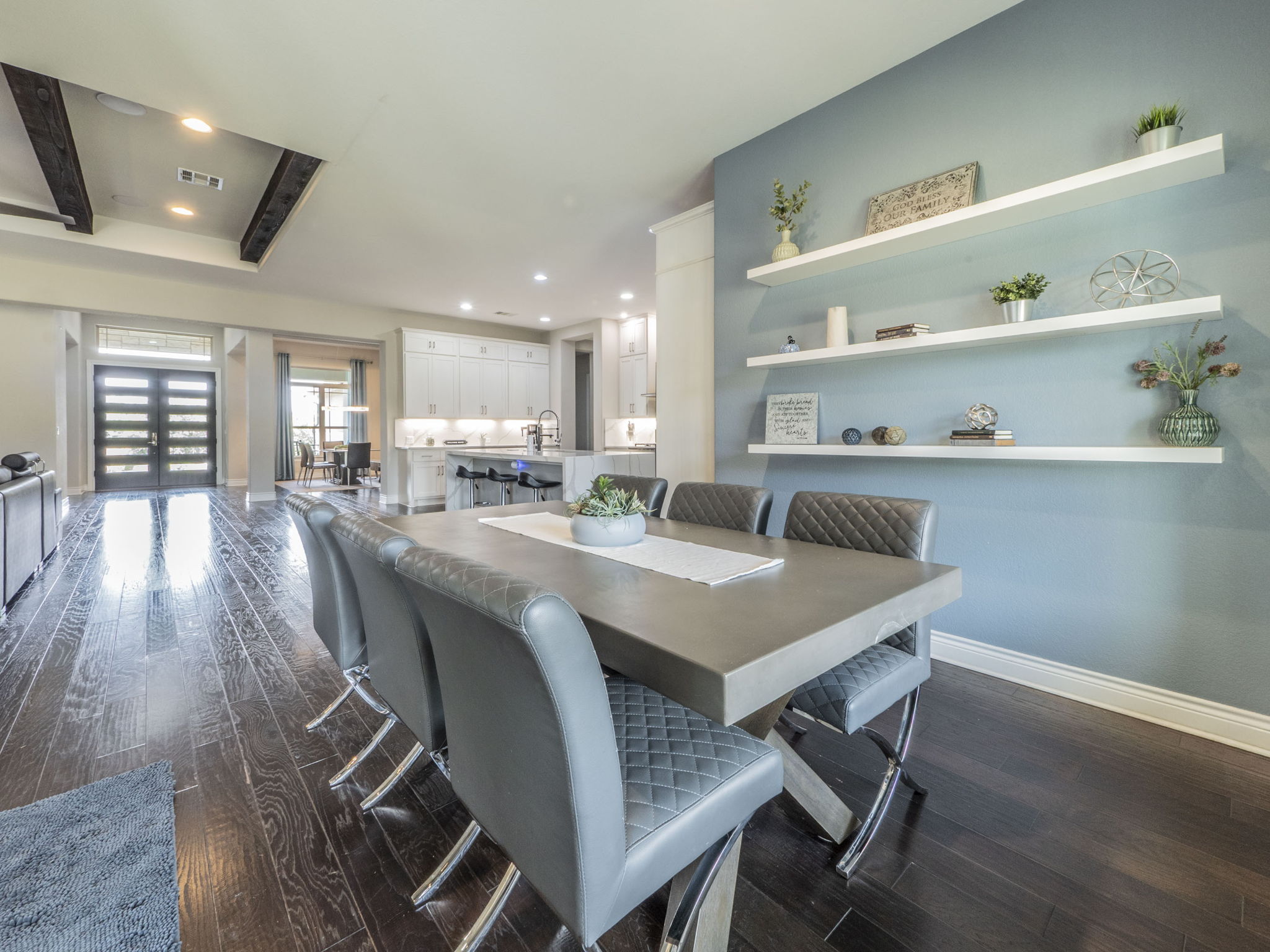 205 Standing Oak Drive Georgetown, TX 78633 - Photo 10 of 40 Dining area with dark wood-type flooring, recessed lighting, and beam ceiling