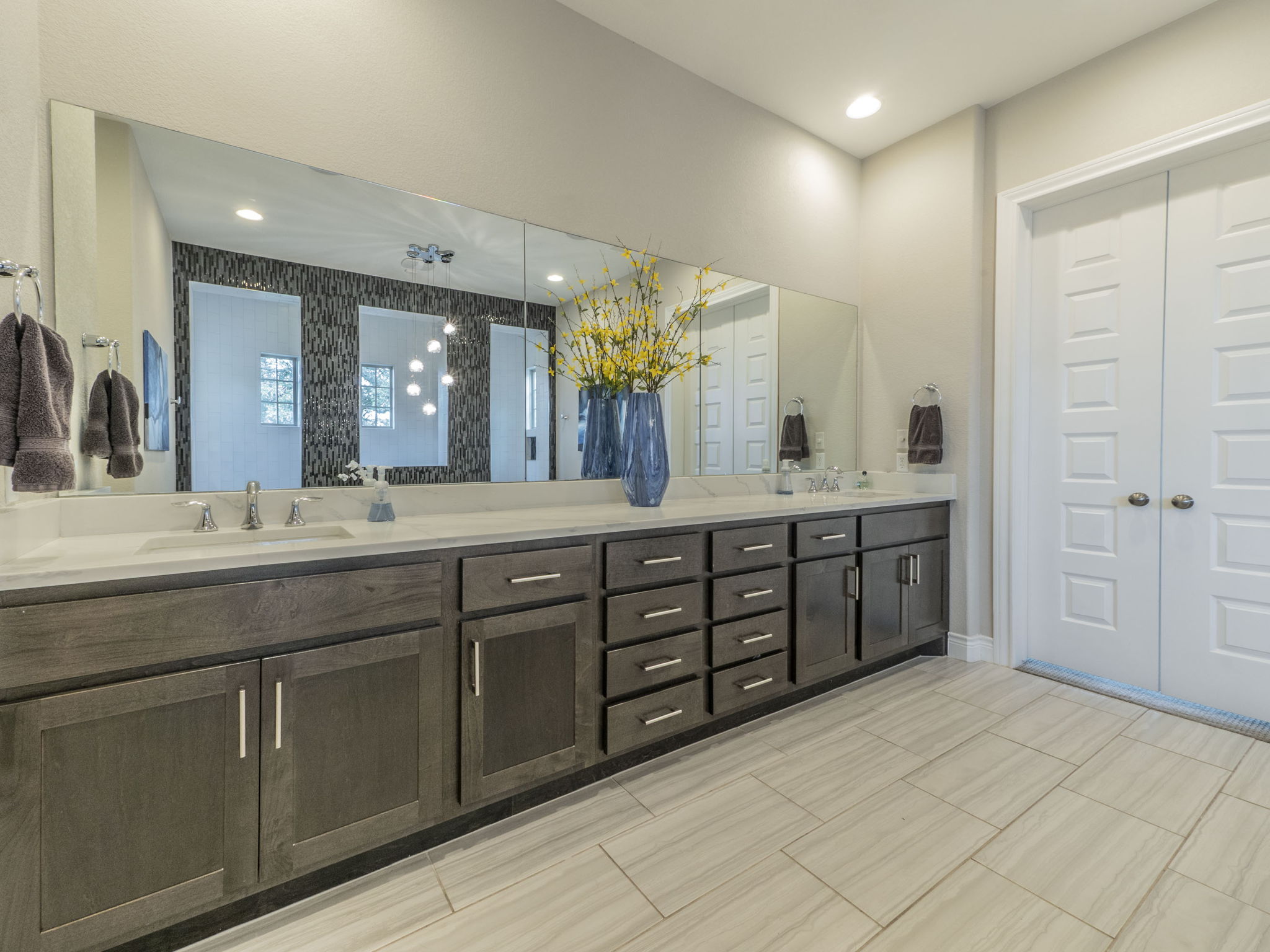 205 Standing Oak Drive Georgetown, TX 78633 - Photo 16 of 40 Full bathroom with double vanity, a walk in shower, and recessed lighting