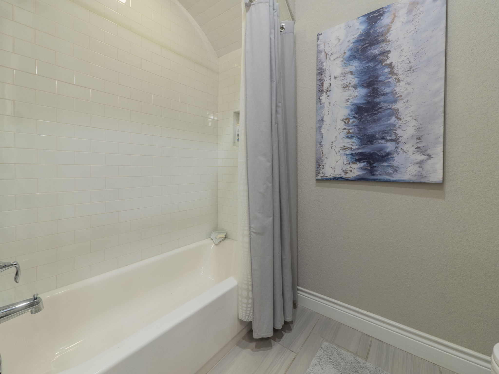 205 Standing Oak Drive Georgetown, TX 78633 - Photo 20 of 40 Full bath with baseboards and shower / tub combo with curtain