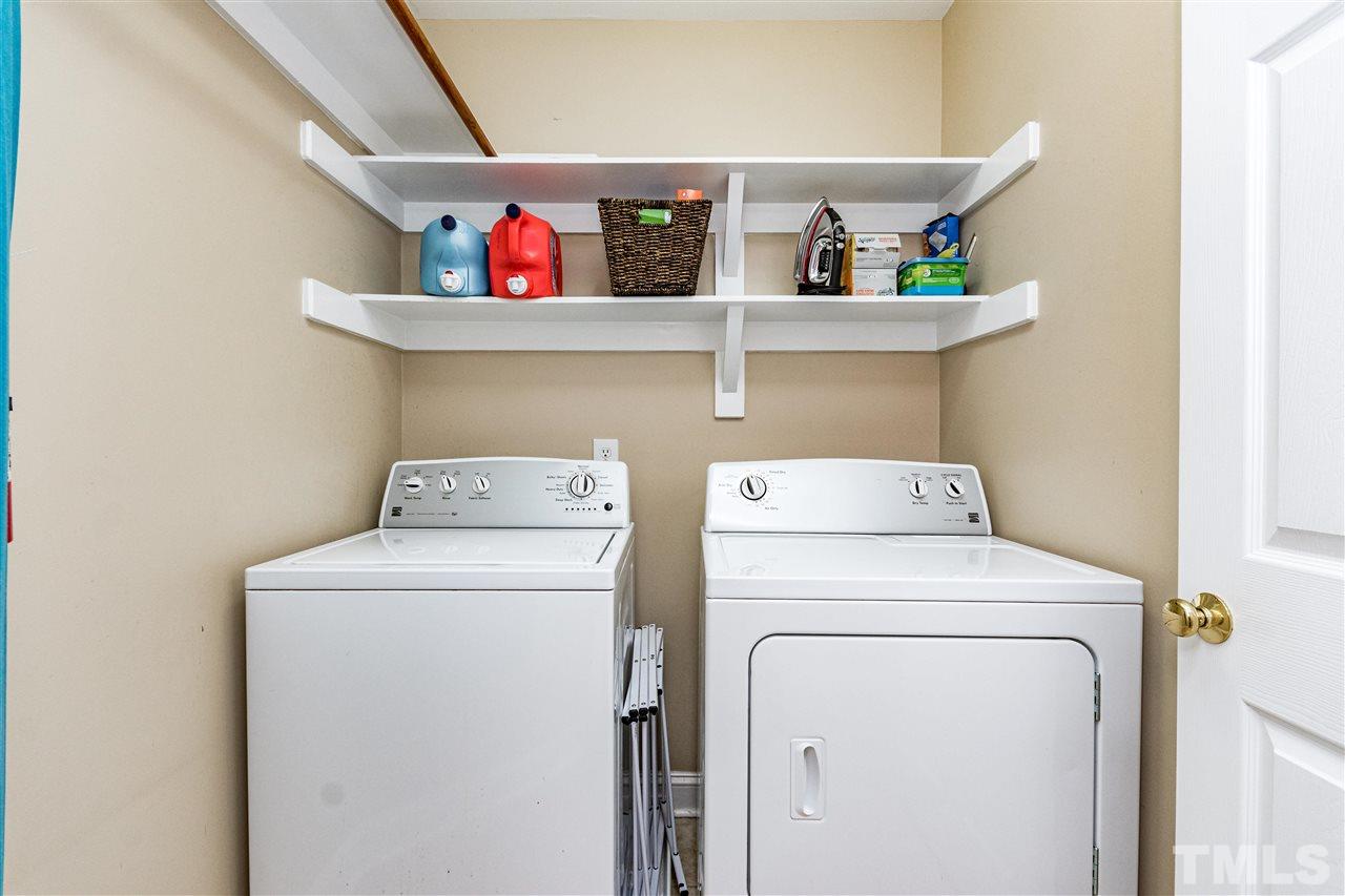 8108 Fallston Court Raleigh, NC 27613 - Photo 20 of 23 a utility room with dryer and washer