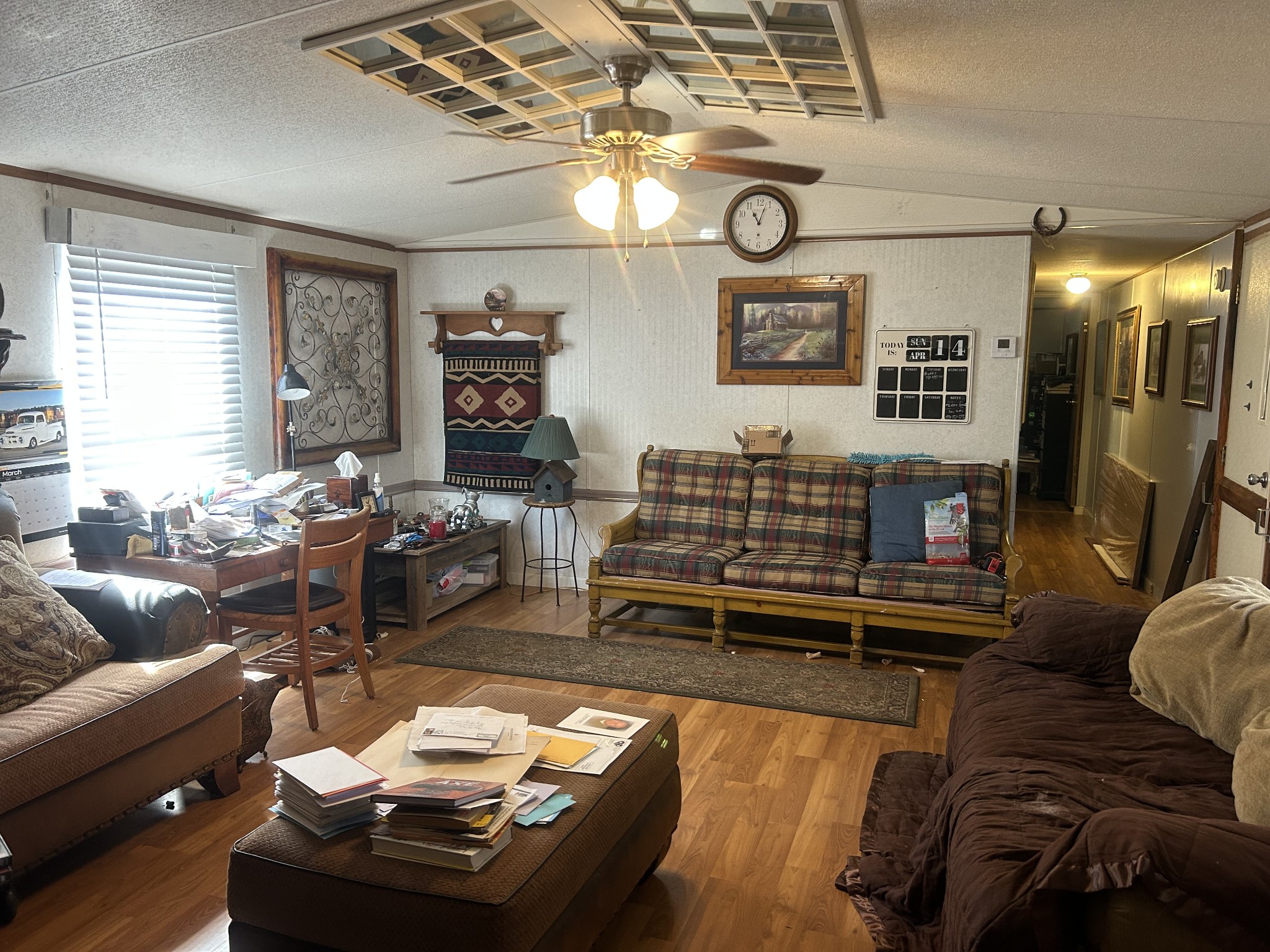 160 Wilson Cemetery Road Big Sandy, TN 38221 - Photo 12 of 20 a living room with furniture and a flat screen tv