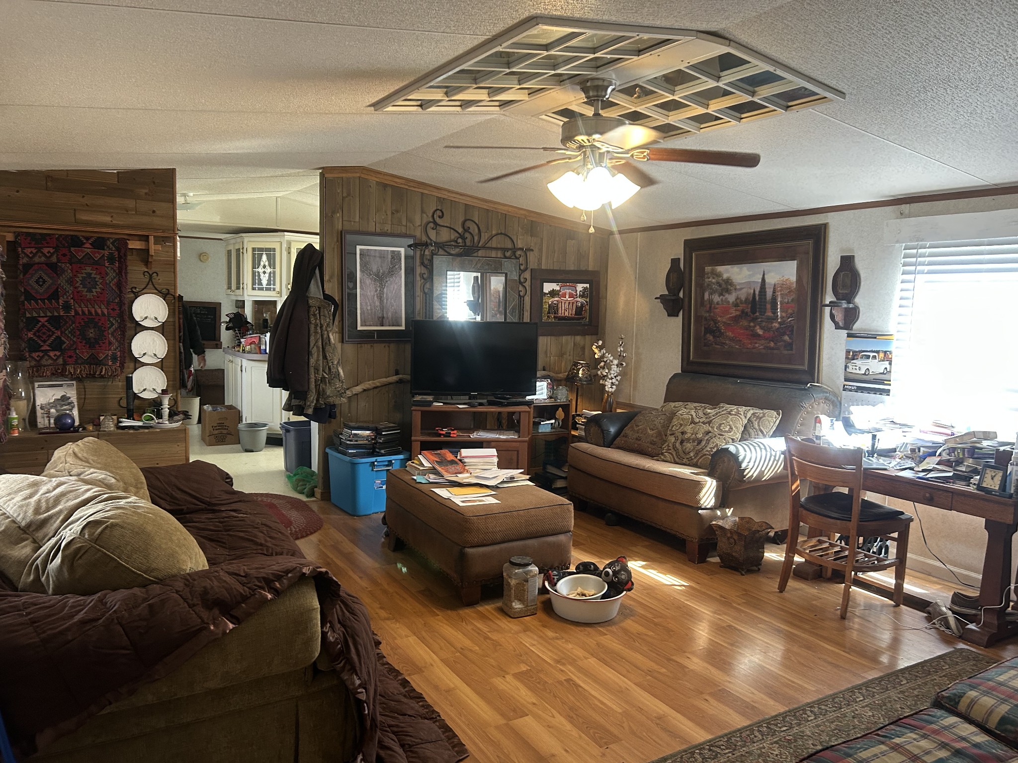 160 Wilson Cemetery Road Big Sandy, TN 38221 - Photo 13 of 20 a living room with furniture and a flat screen tv