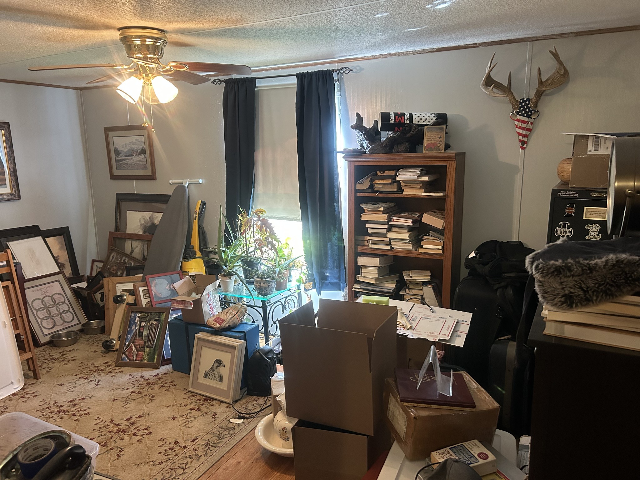 160 Wilson Cemetery Road Big Sandy, TN 38221 - Photo 16 of 20 a view of a workspace with furniture and toys
