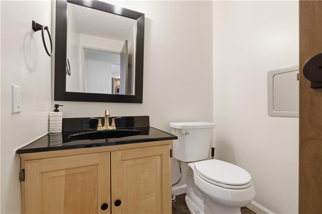 146 Locust Court Pittsburgh, PA 15237 - Photo 12 of 32 a bathroom with a toilet sink and mirror