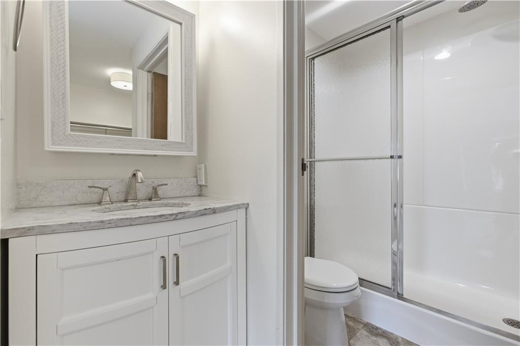146 Locust Court Pittsburgh, PA 15237 - Photo 16 of 32 a bathroom with a granite countertop sink toilet and shower