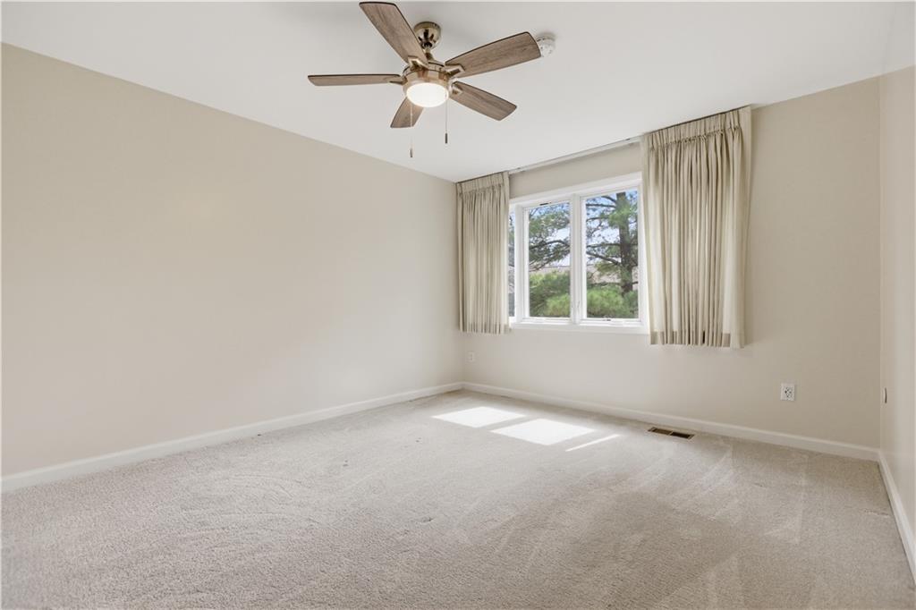 146 Locust Court Pittsburgh, PA 15237 - Photo 19 of 32 an empty room with windows and fan