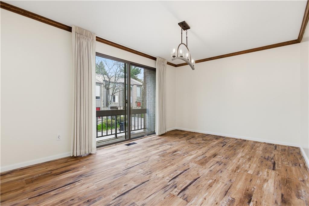 146 Locust Court Pittsburgh, PA 15237 - Photo 4 of 32 a view of a livingroom with wooden floor and a ceiling fan