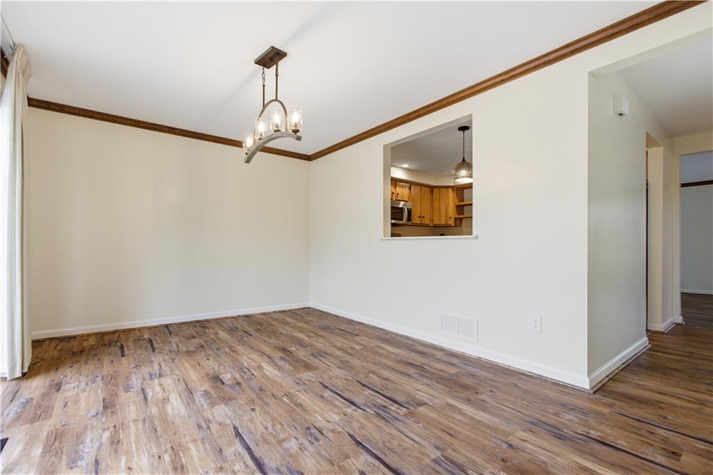 146 Locust Court Pittsburgh, PA 15237 - Photo 5 of 32 a view of a hallway with wooden floor and front door